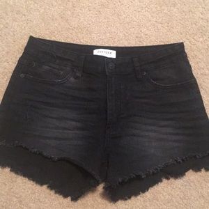 Distressed jean shorts.